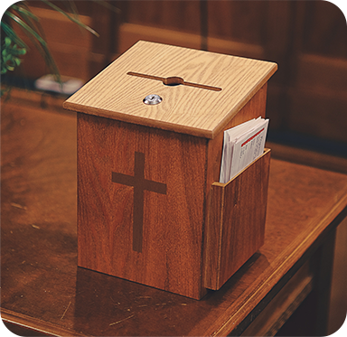 Image of a wooden tithe box.